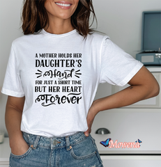 A mother holds hear daughter's hand 